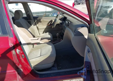 2005 Toyota Corolla Le z USA, uszkodzony, nr VIN 1NXBR32E65Z358885